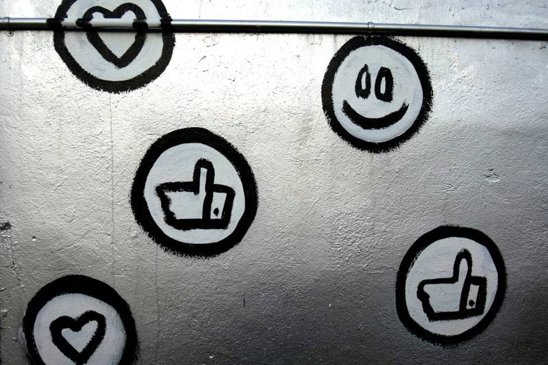 a bunch of stickers that are on a wall