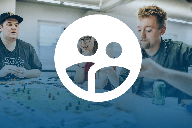 people playing board games