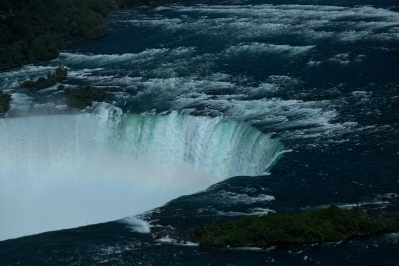 a large waterfall with water pouring out of it