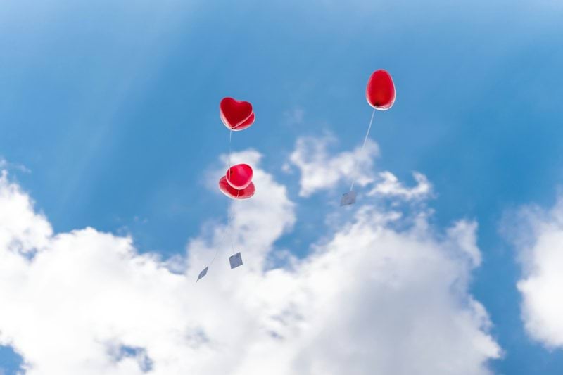 a group of hot air balloons in the sky