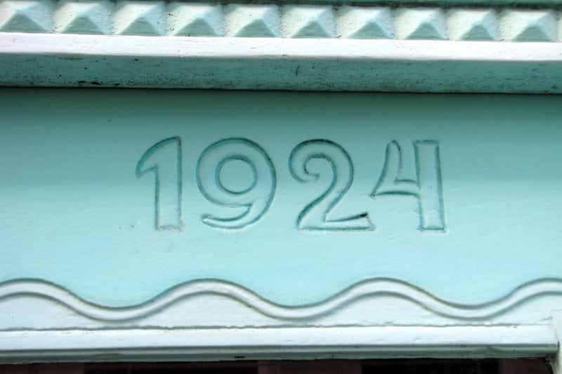 a close up of a sign on a building