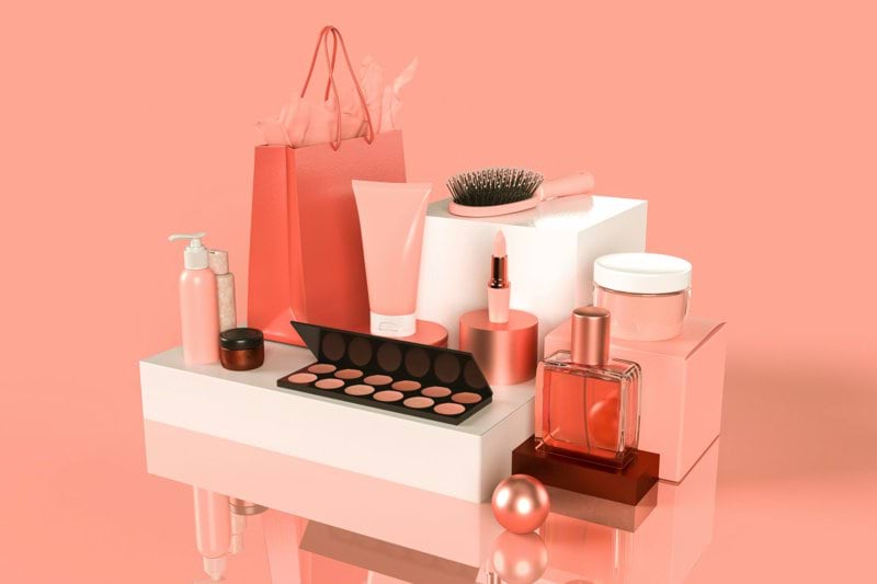 a table topped with a bunch of different types of cosmetics