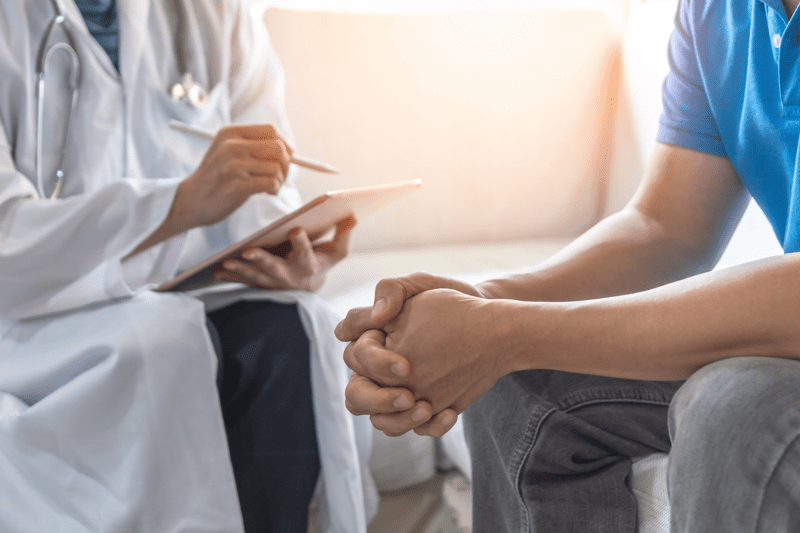 Doctor sat down with a patient 