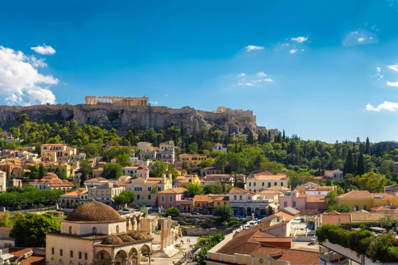 a city with a hill in the background