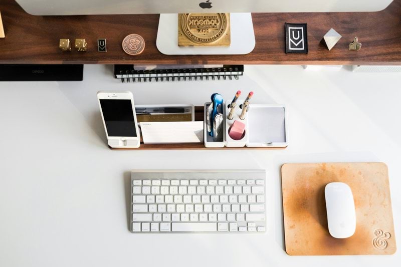 white Apple mouse beside keyboard