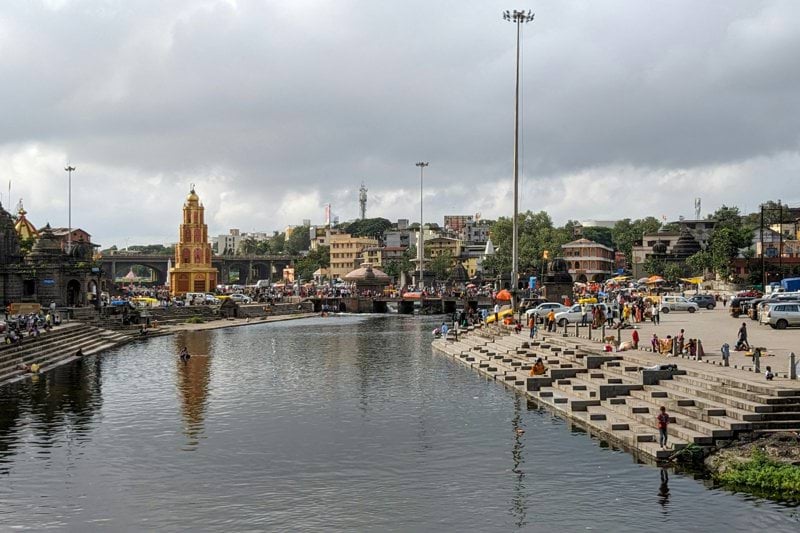 a body of water surrounded by a city
