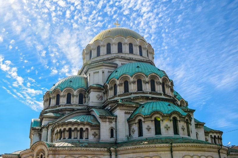 green and blue dome building under blue sky during daytime