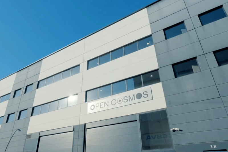Building front with Open Cosmos Logo
