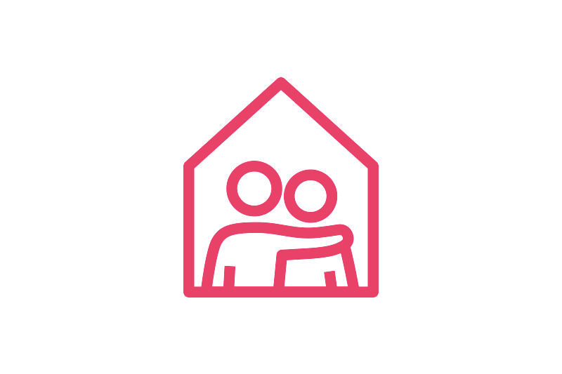 Pink line icon of two people embracing inside a house outline, representing a caring, customer‑focused approach and feeling at home.