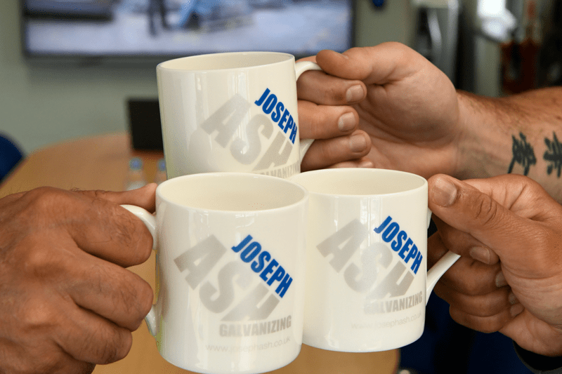 holding joseph ash galvanizing mugs