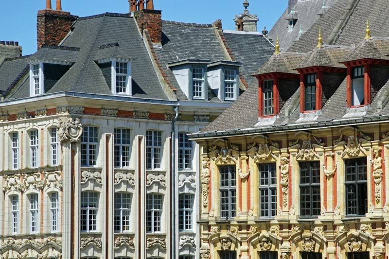 a row of old buildings in a city