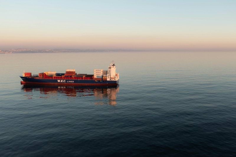 a large boat floating on top of a large body of water