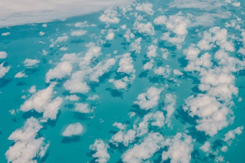 clouds over blue sea