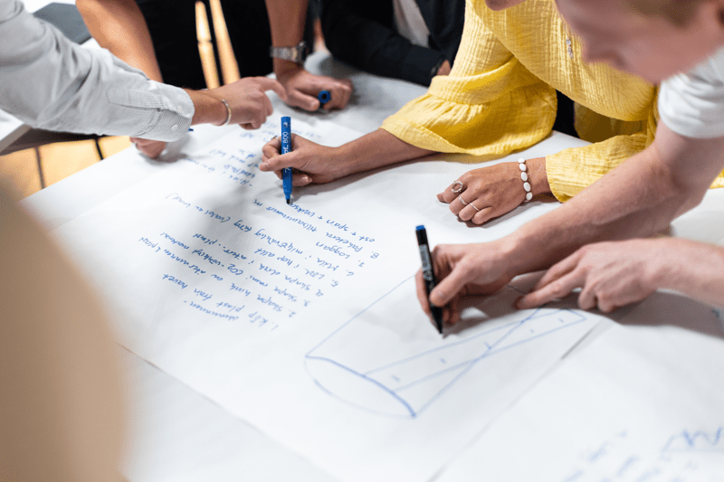 people drawing and planning