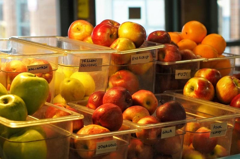 a bunch of fruit that are sitting on a table