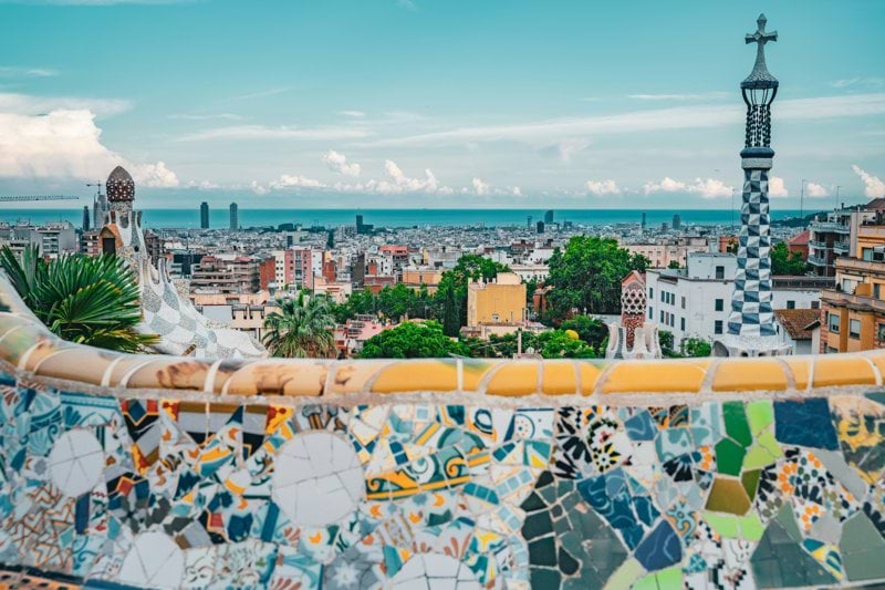 a view of a city from a tiled roof