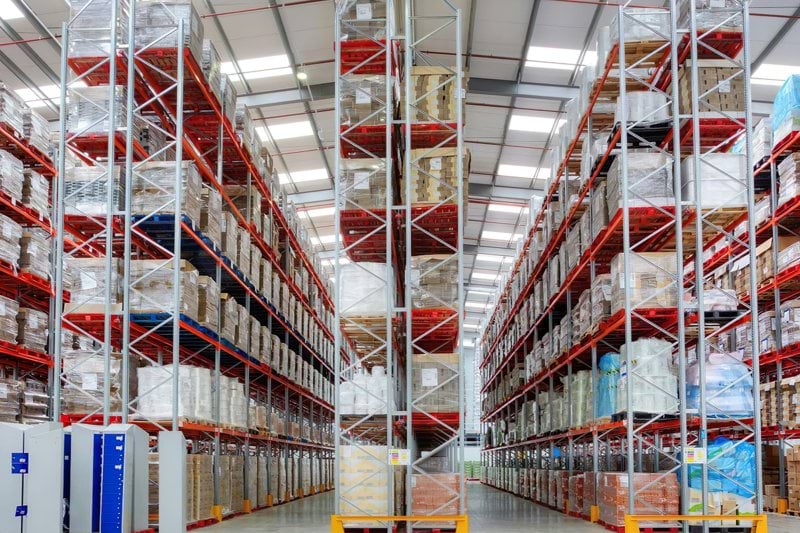 a large warehouse filled with lots of shelves