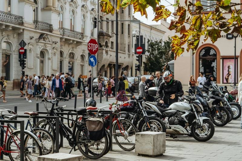 a group of motorcycles parked next to each other on a street