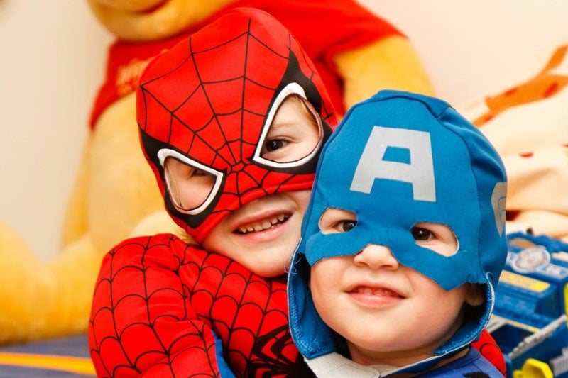kids in spiderman and Captain America costumes