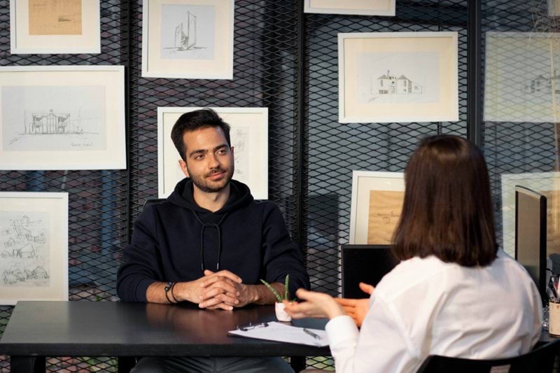 a man and a woman sitting at a table