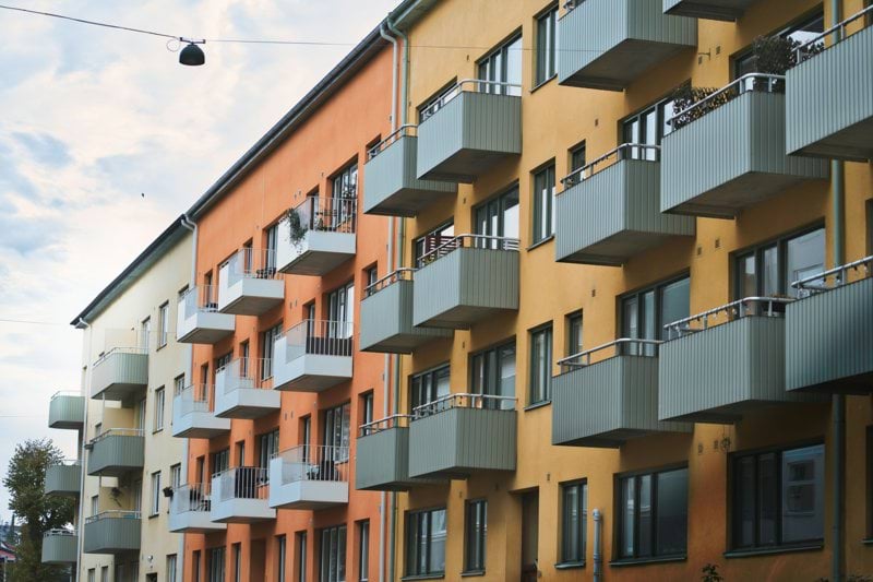 an apartment building with balconies and balconies on the balconies