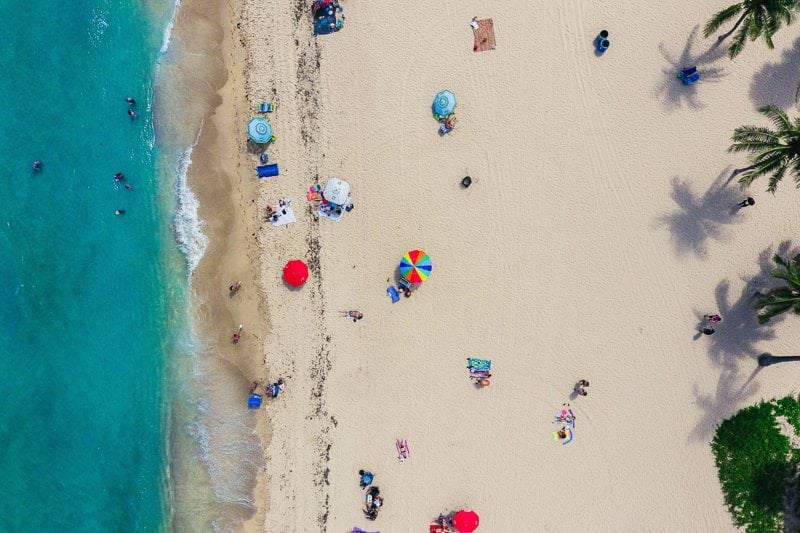 aerial photography of people gathering on shore