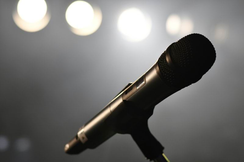 black microphone on stand