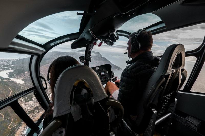 two person riding on airplane at daytime