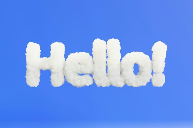 a cloud shaped word spelling hello on a blue background