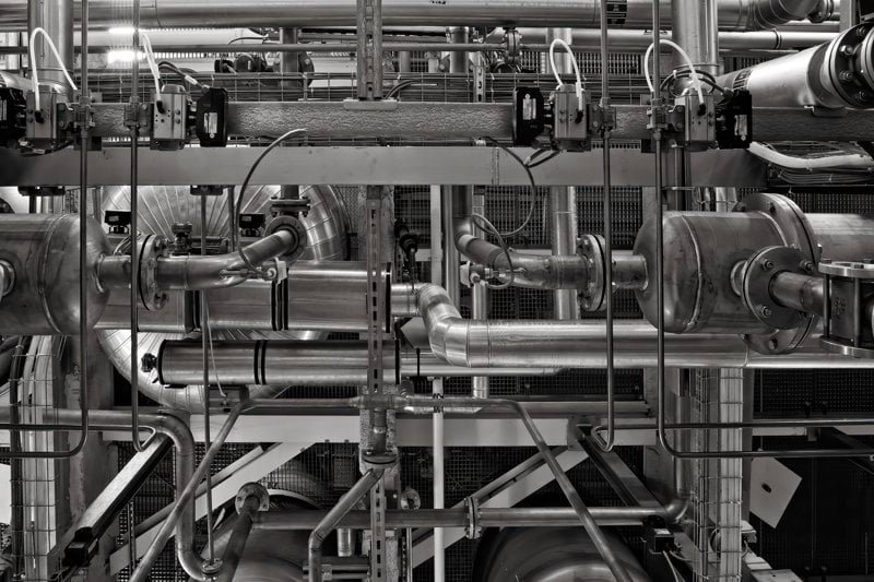 stainless steel and red industrial machine