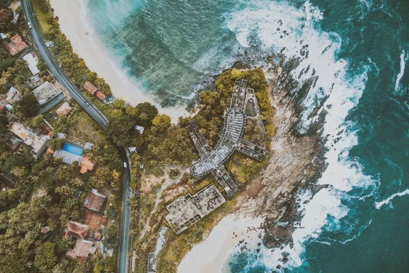aerial photography of houses and buildings near body of water