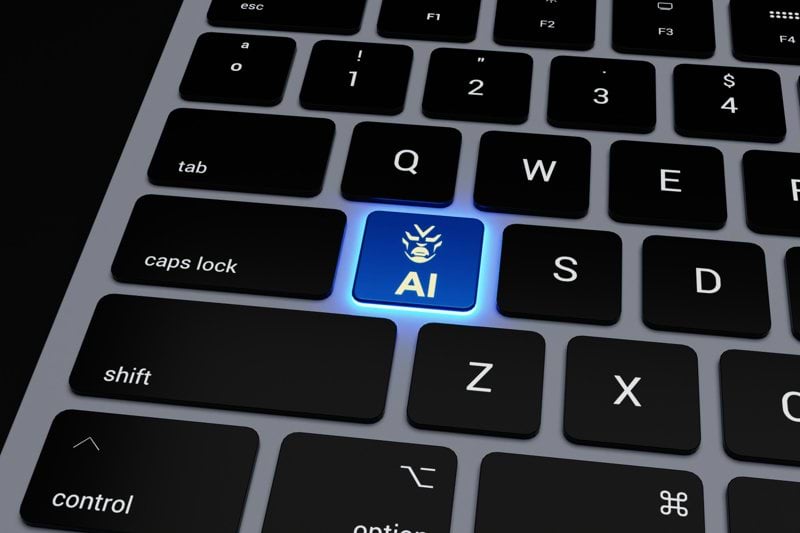 a computer keyboard with a blue light on it