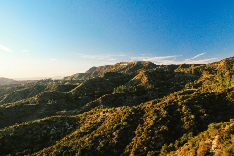 green and brown mountains under blue sky during daytime