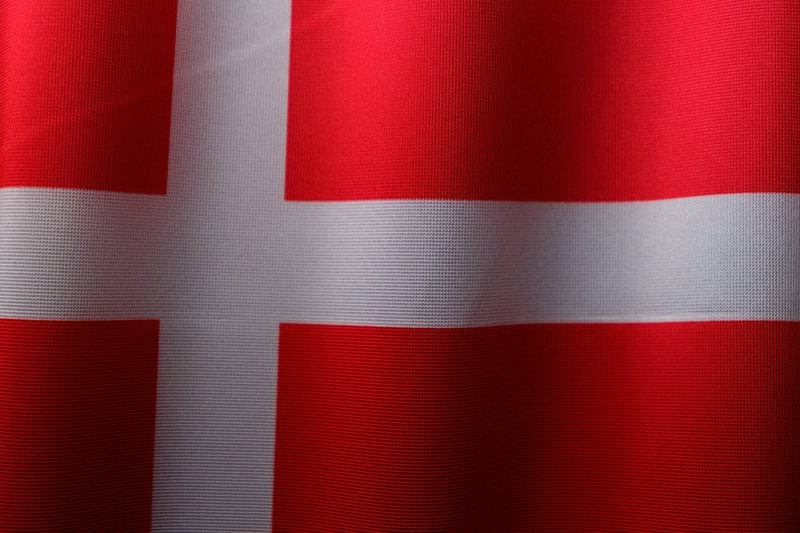 a close up of a red and white flag