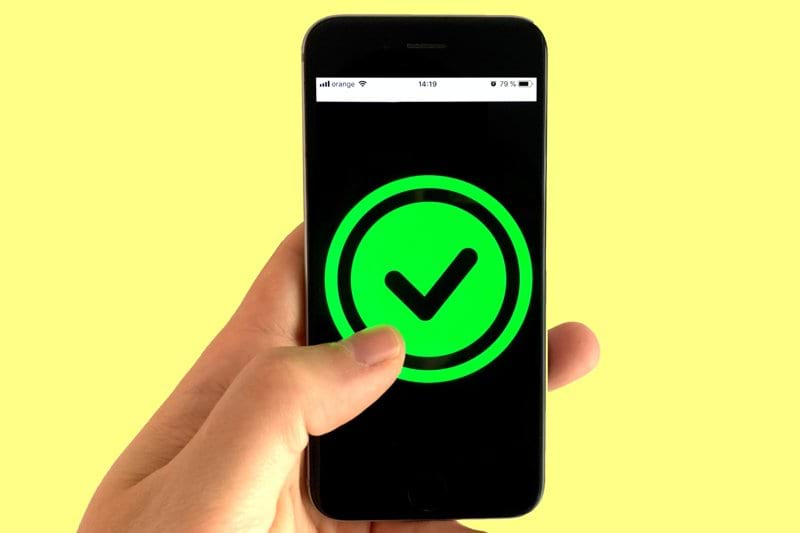 black android smartphone displaying green and black logo