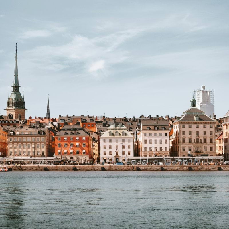 a body of water with buildings along it