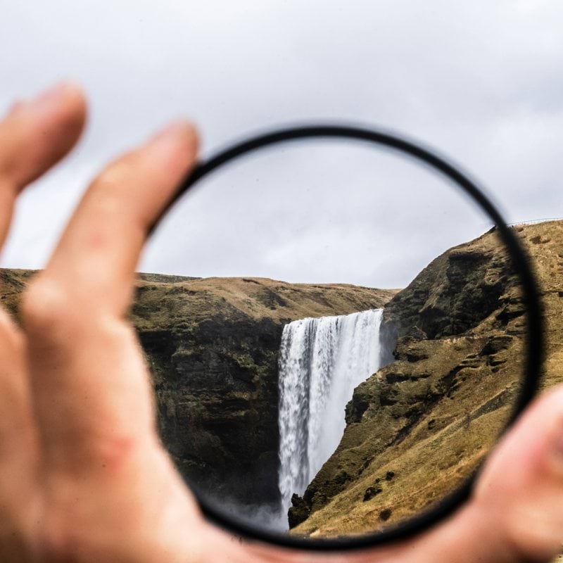 selective focus photography of waterfalls