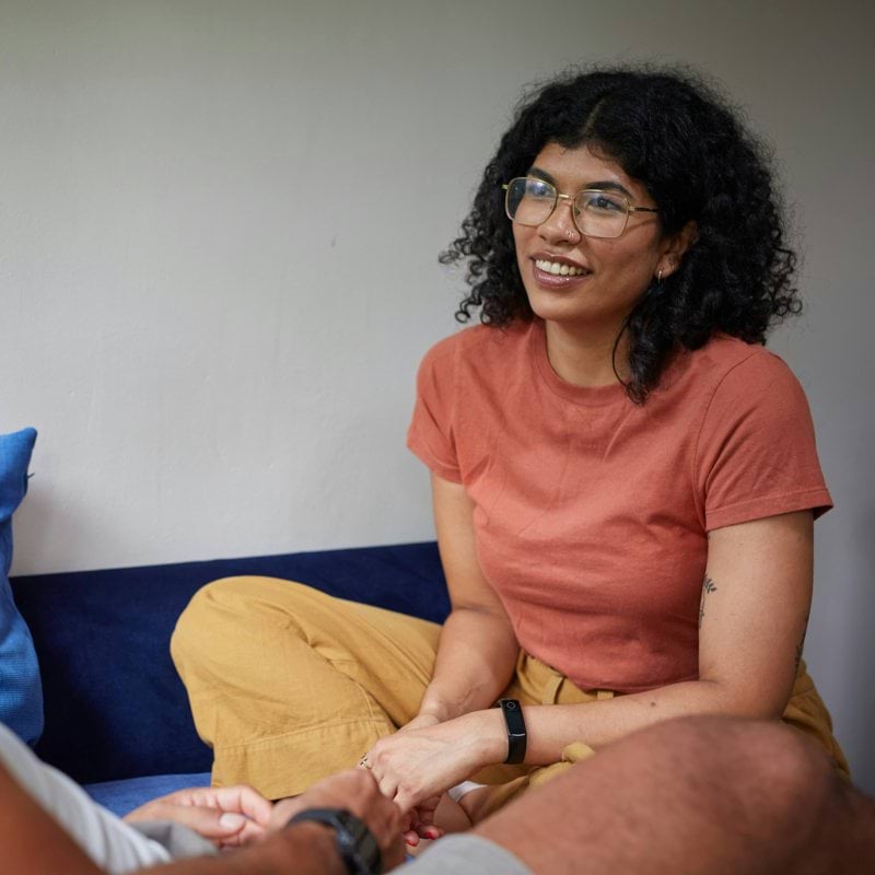 a man and a woman sitting on a couch