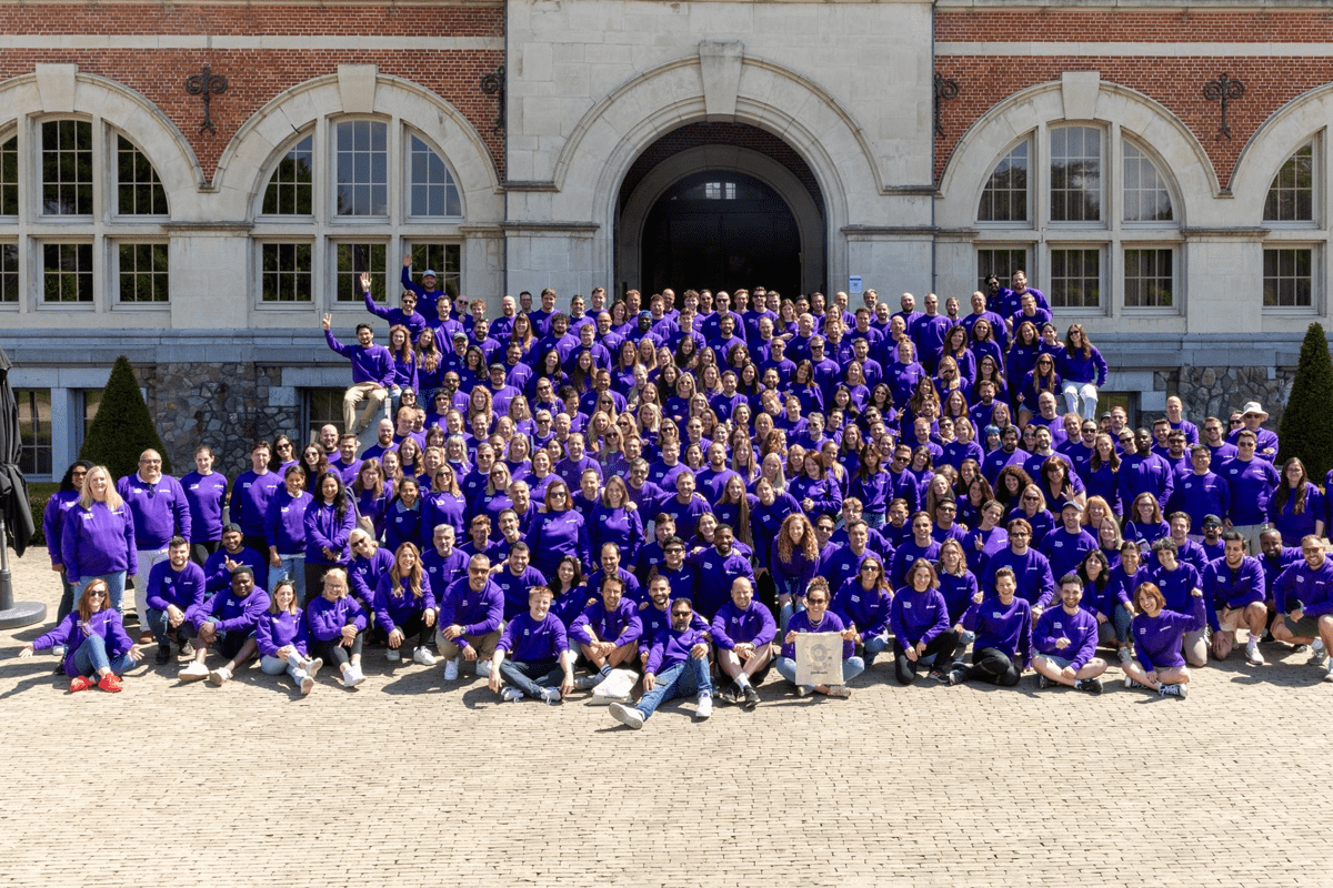 The GoodHabitz team together in purple, May 2025