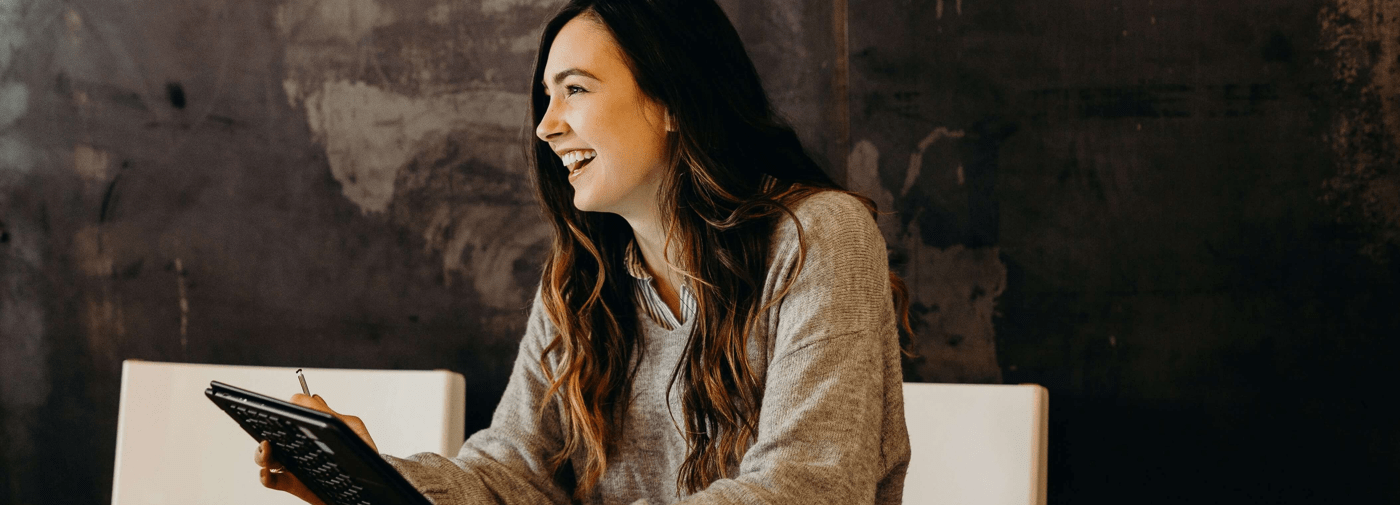 A woman working in mental health and social care recruitment for a blog about understanding and hiring for the supported living sector