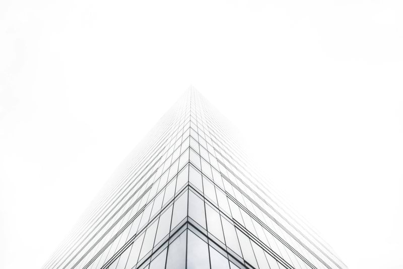 bottom view of glass building