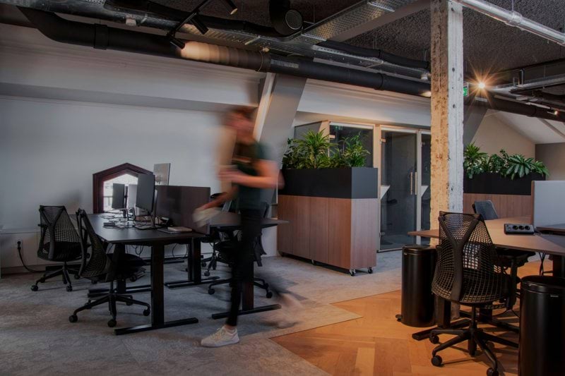 a blurry photo of a man in an office