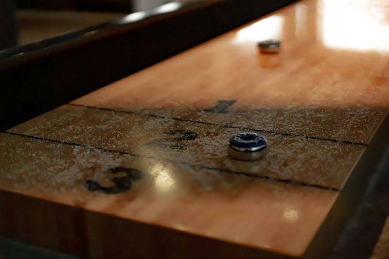A close up of a shuffleboard table 
